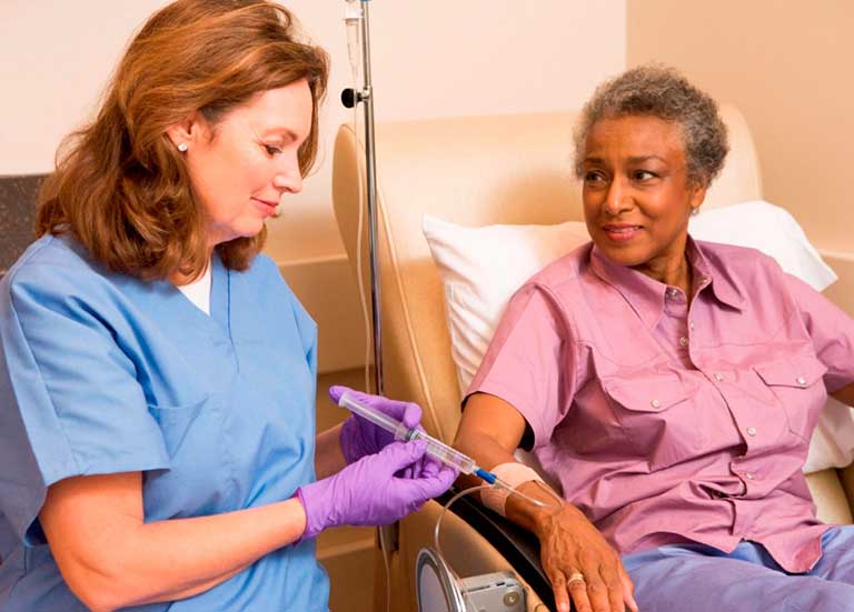 nurse giving patient injection